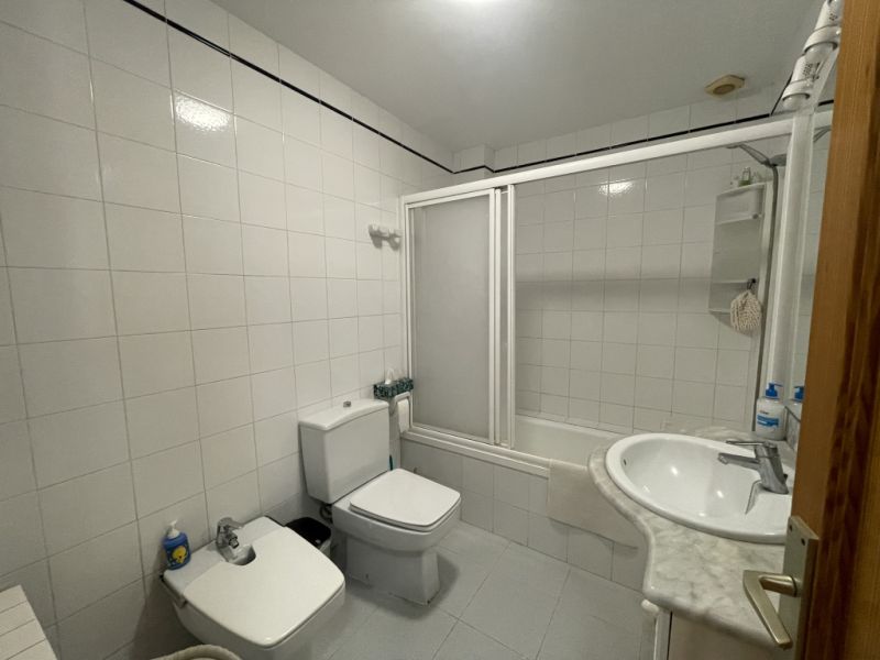 SAISON: Parterreapartment mit Pool und AC, Kamin in 1. Linie der Küste von Porto Colom -- AP 159 T