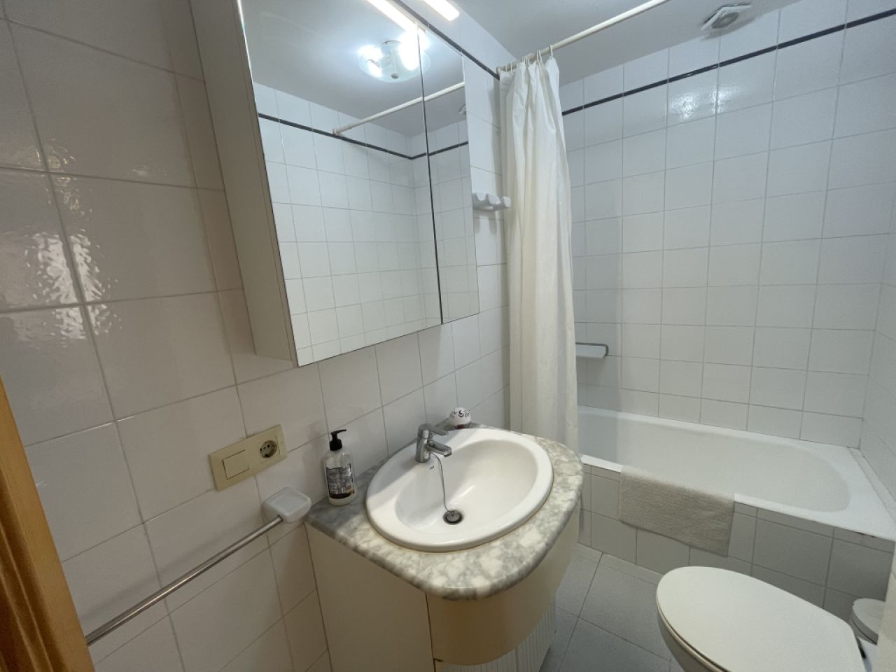 SAISON: Parterreapartment mit Pool und AC, Kamin in 1. Linie der Küste von Porto Colom -- AP 159 T